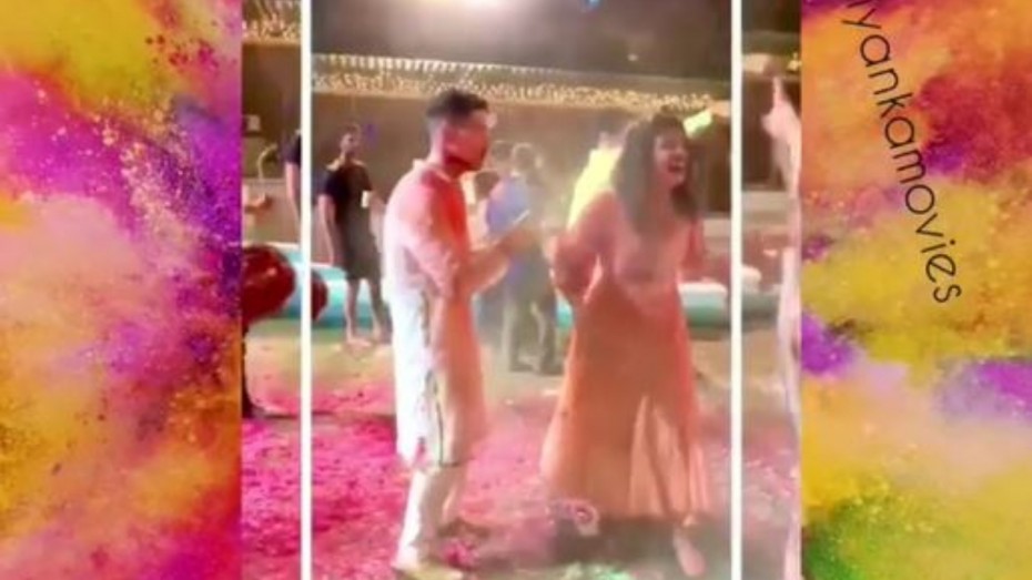 Nick Jonas Cleans Hands Using Priyanka Chopraa S Dress At Holi Bash In This Hilarious Video News Nation English